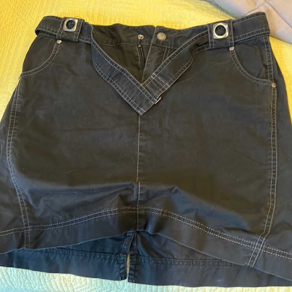 Athleta size 10 skirt with back slit. Belt. Soft black in color.
